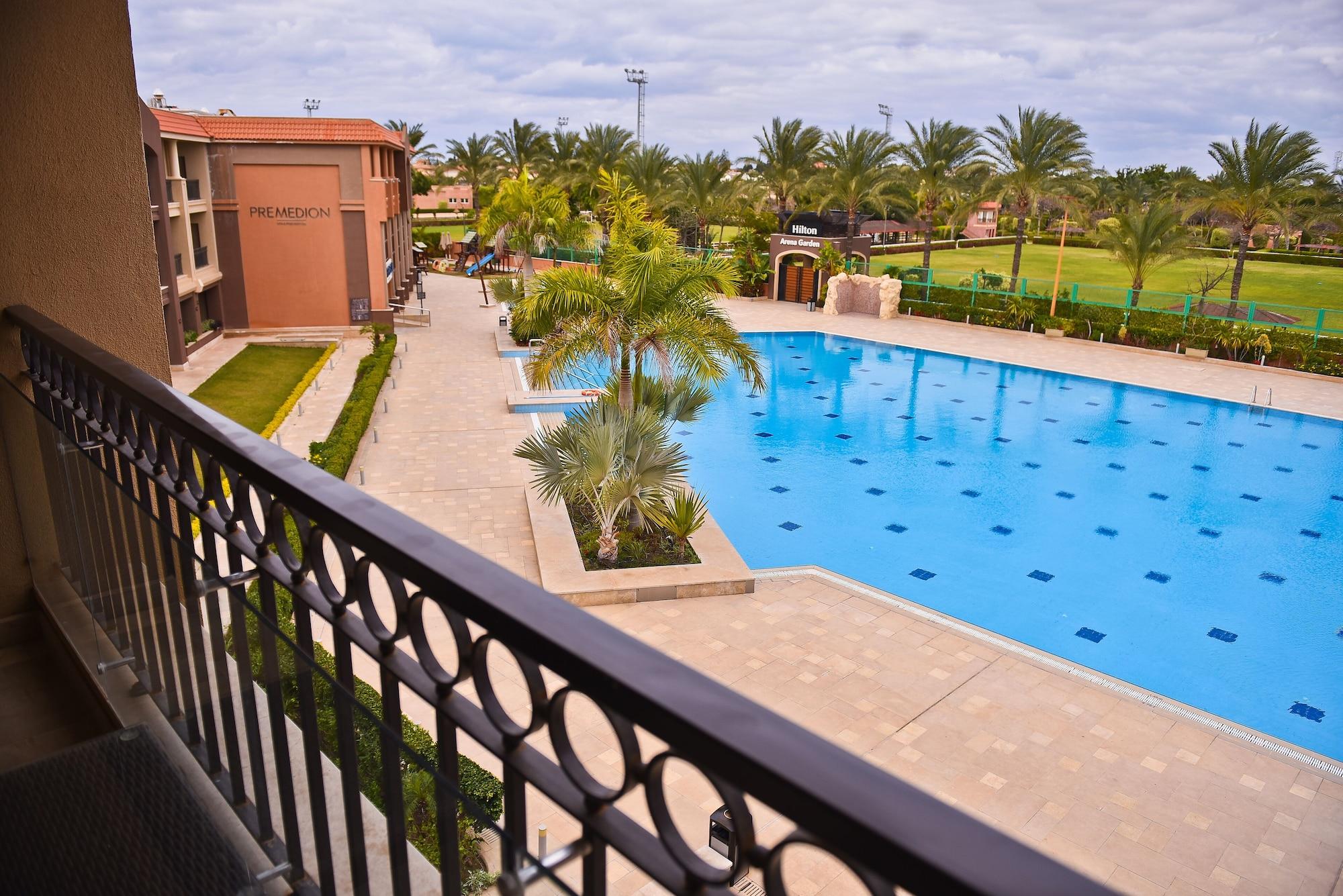 Hilton Alexandria King'S Ranch Hotel Кинг Мариут Екстериор снимка View of the pool at the Palm Hills golf club